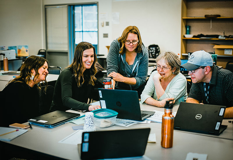 Team working together on laptop