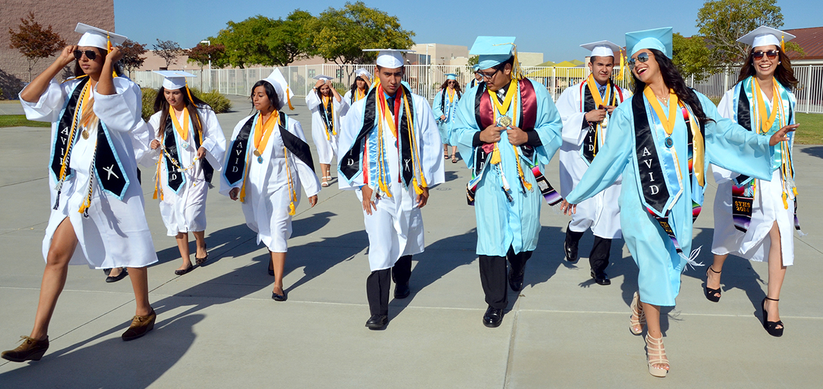 image of AVID graduates walking through campus